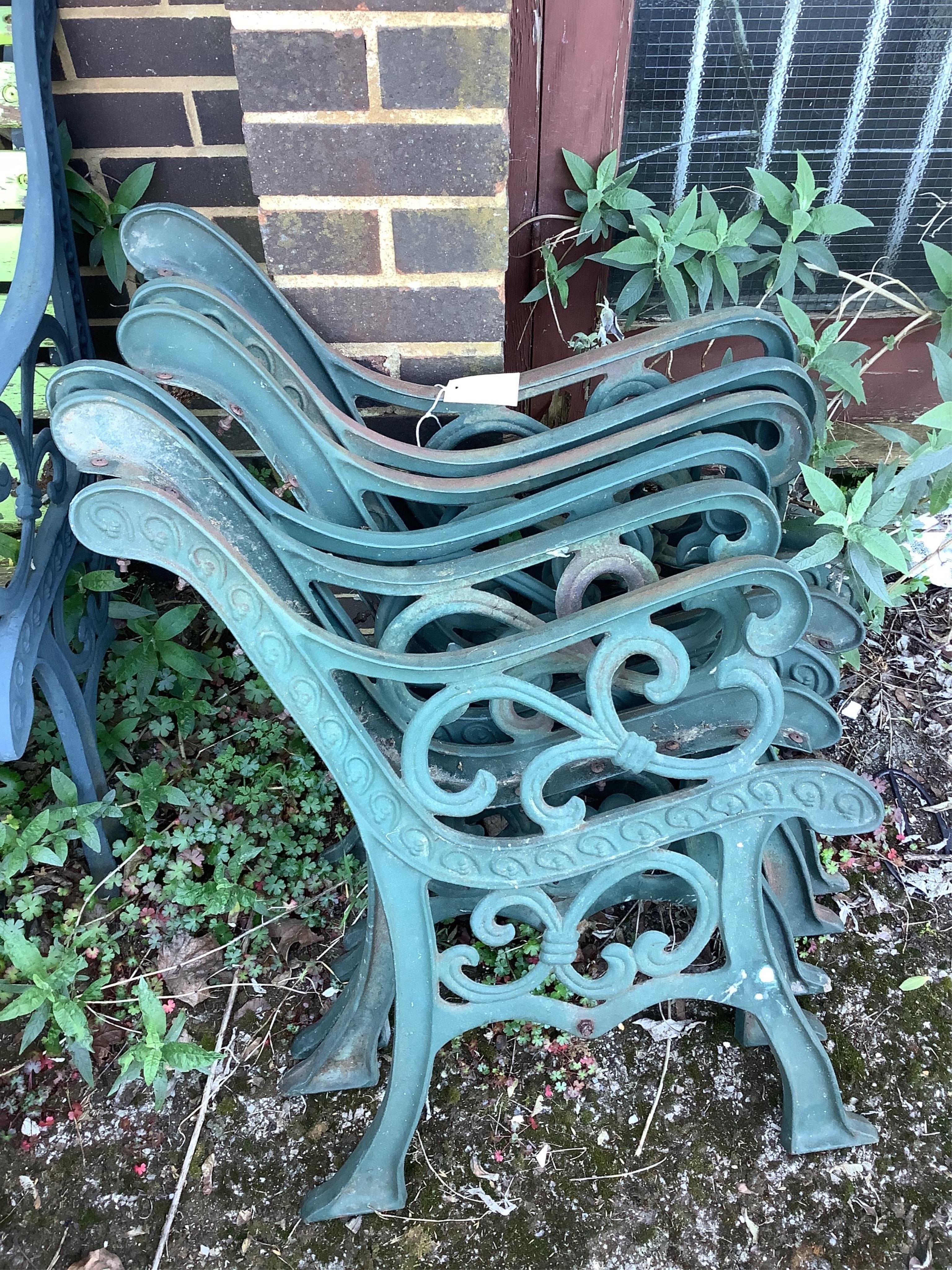 Six (three pairs) of Victorian style cast iron bench ends